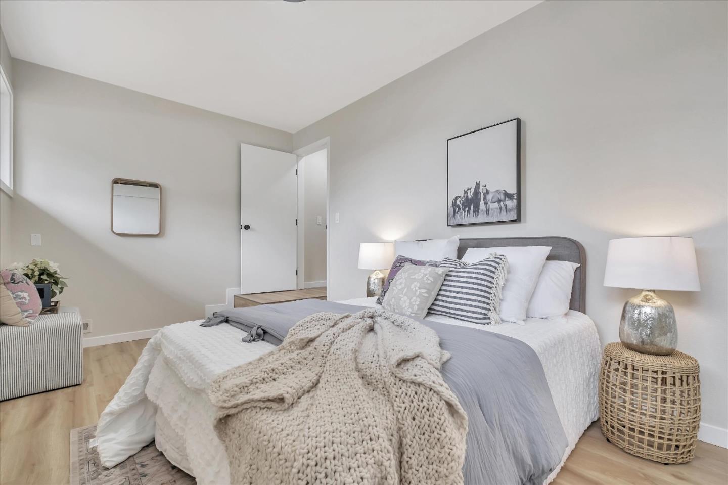 3400 Haas Drive Aptos, CA 95003 - Photo 24 of 35 a bedroom with a bed and a lamp