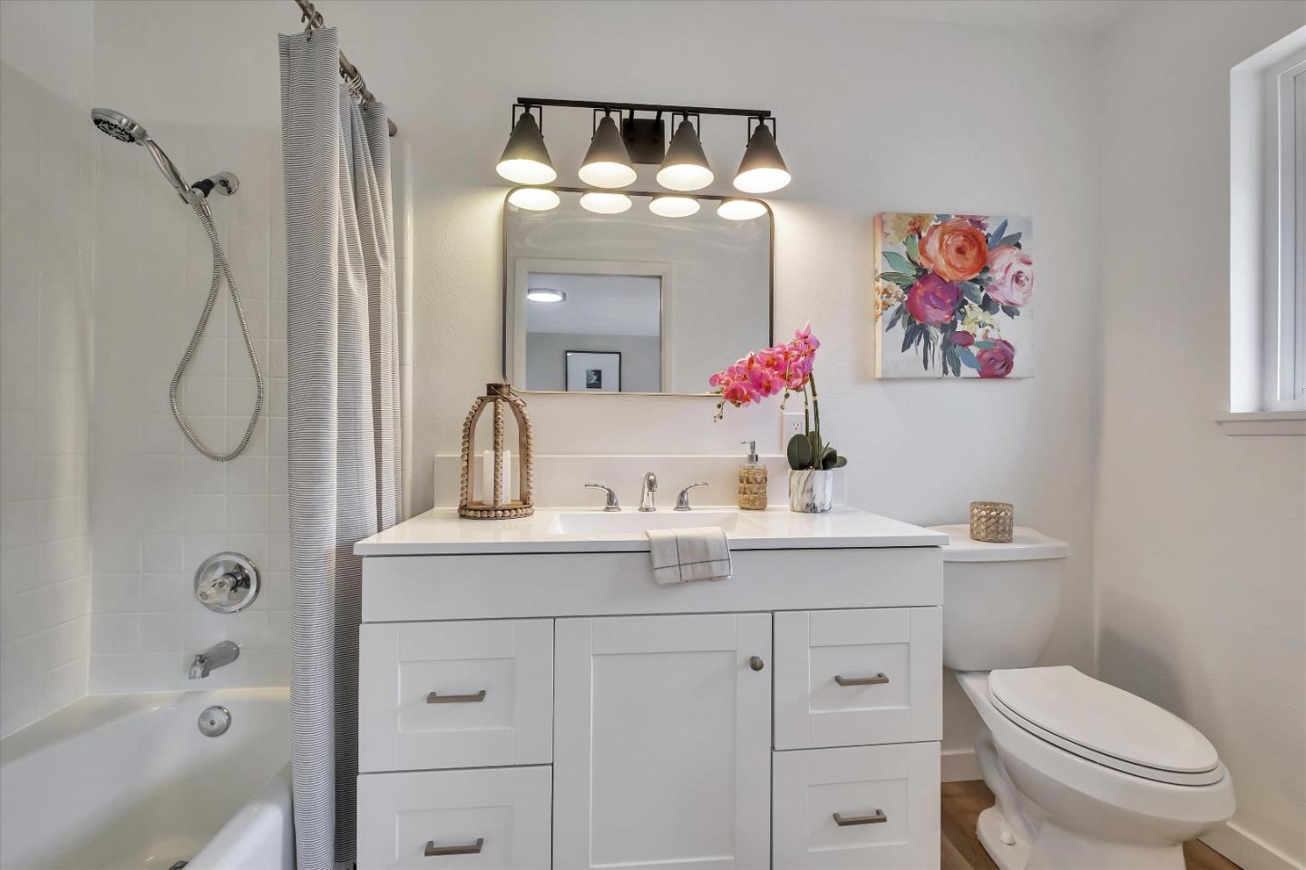 3400 Haas Drive Aptos, CA 95003 - Photo 25 of 35 a bathroom with a sink vanity mirror and toilet