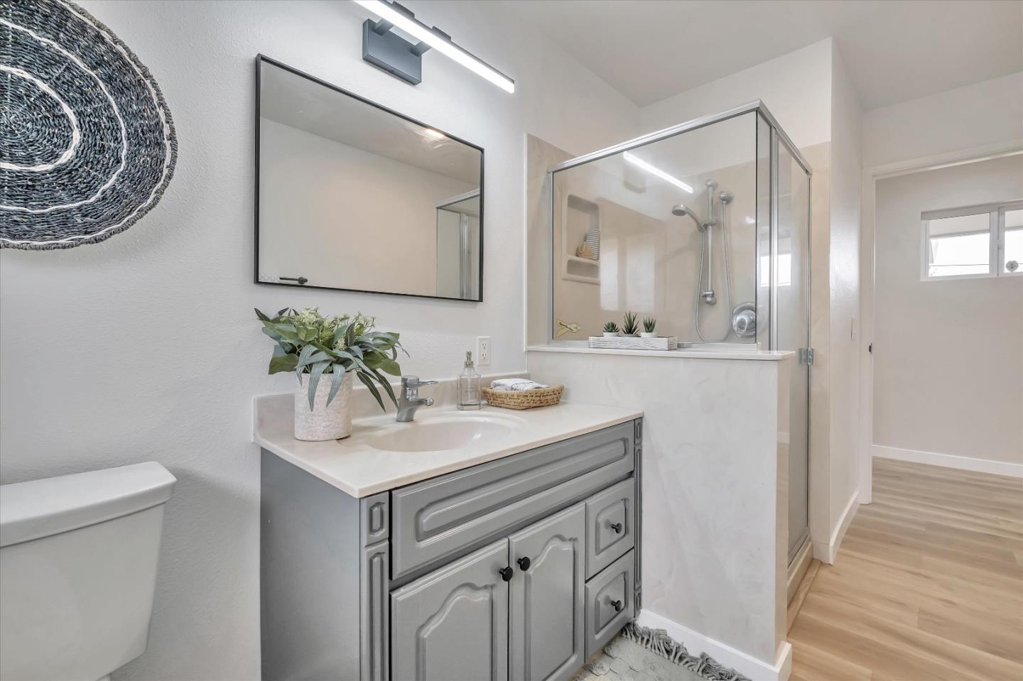3400 Haas Drive Aptos, CA 95003 - Photo 26 of 35 a bathroom with a toilet a sink and a mirror