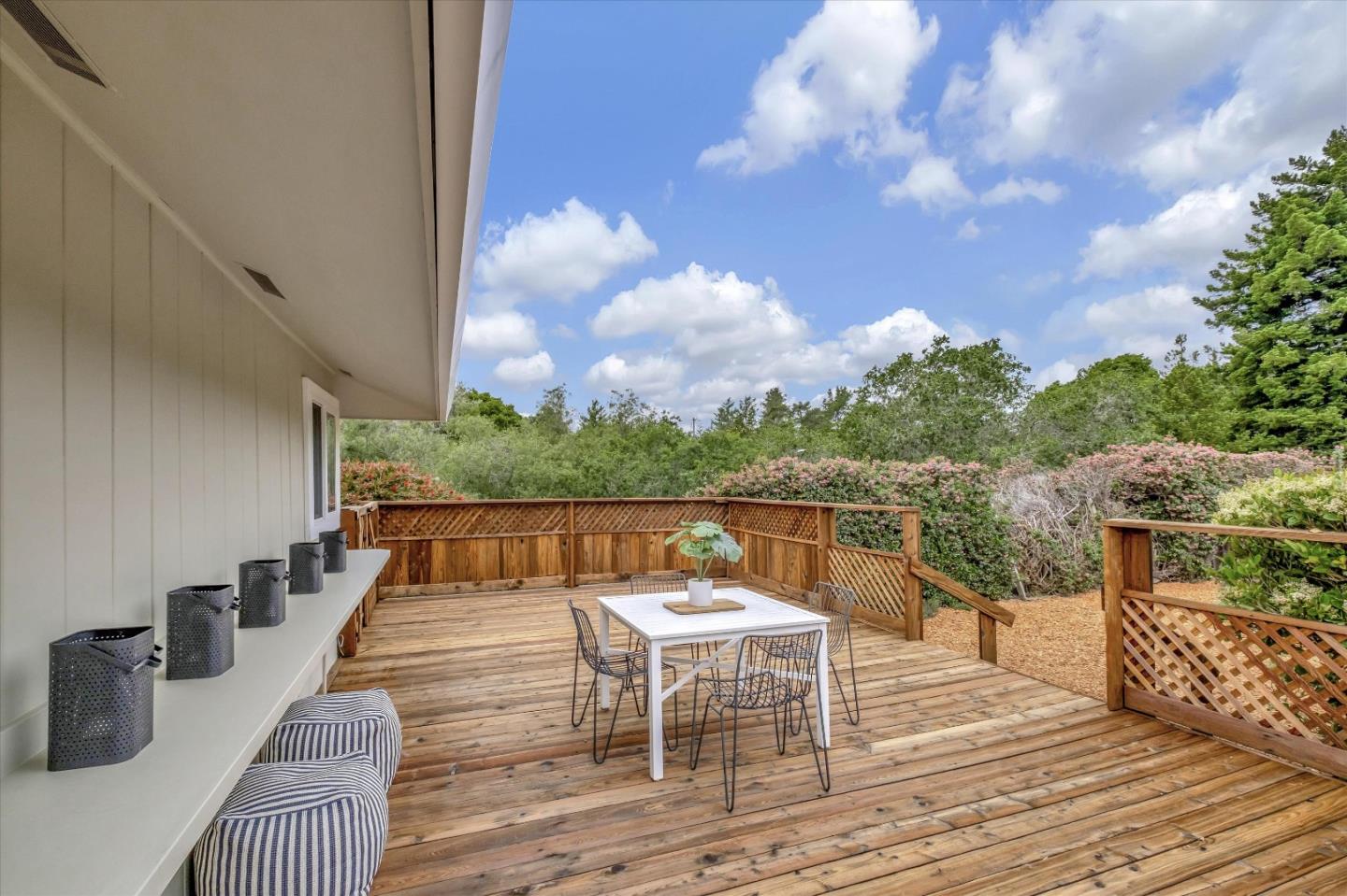 3400 Haas Drive Aptos, CA 95003 - Photo 27 of 35 a balcony with wooden floor table and chairs