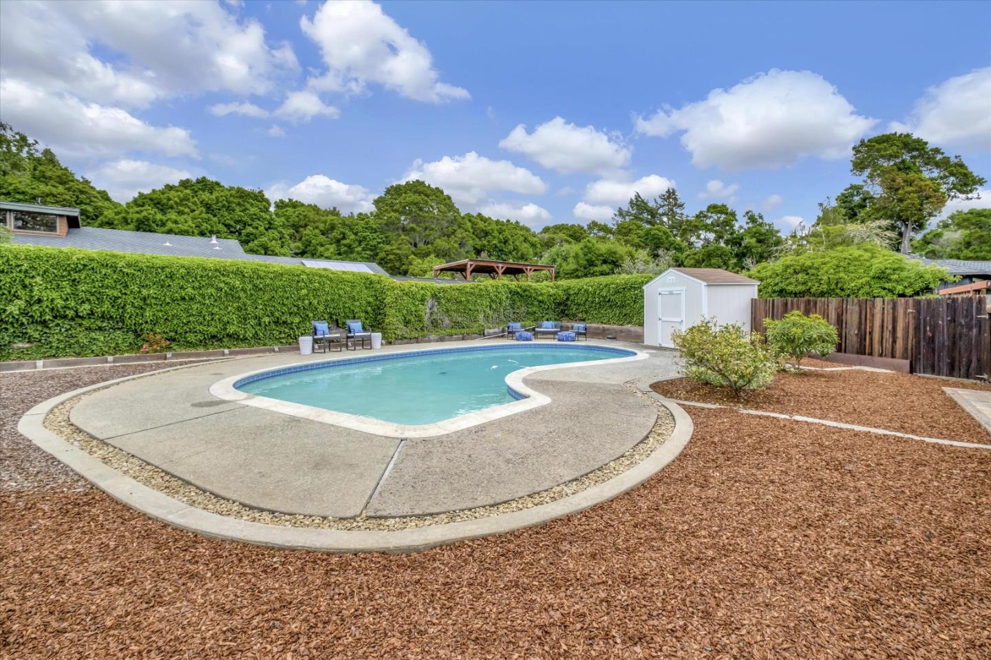 3400 Haas Drive Aptos, CA 95003 - Photo 30 of 35 a view of a swimming pool and a yard