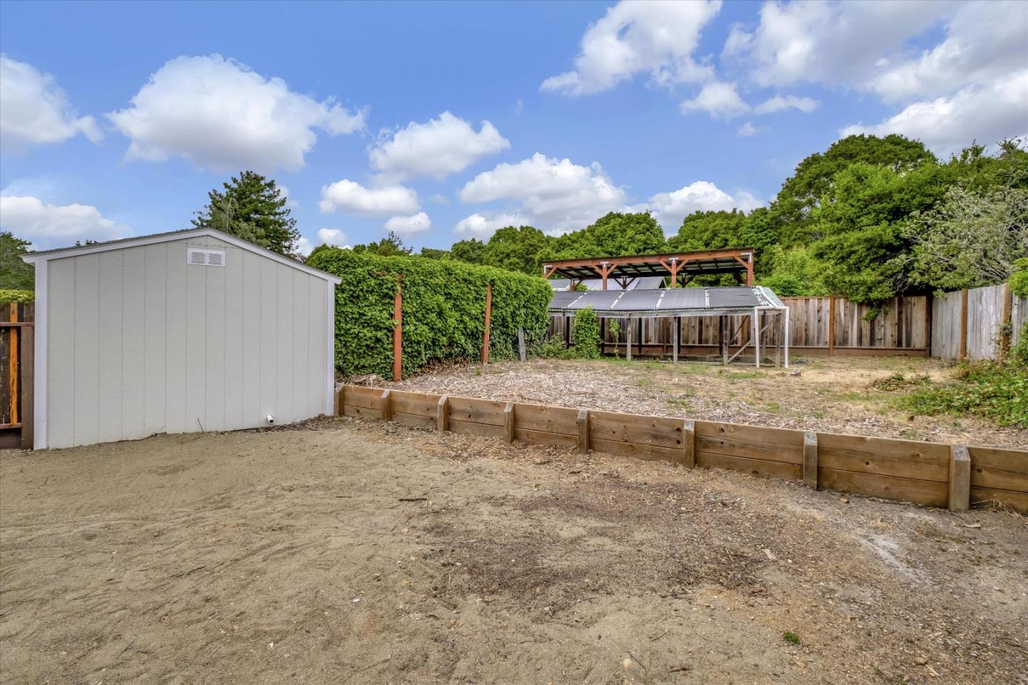 3400 Haas Drive Aptos, CA 95003 - Photo 34 of 35 a view of a house with a yard and sitting area