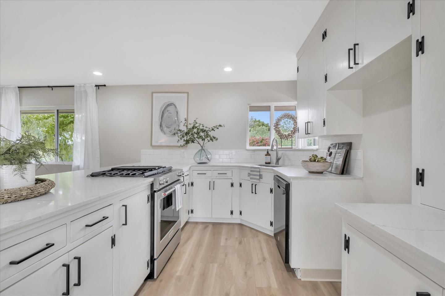 3400 Haas Drive Aptos, CA 95003 - Photo 7 of 35 a kitchen with granite countertop a sink stove and cabinets