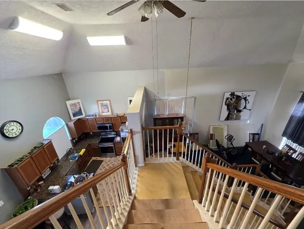 a view of a workspace with furniture and toys
