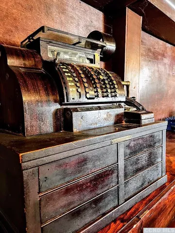 a stove top oven sitting inside of a kitchen