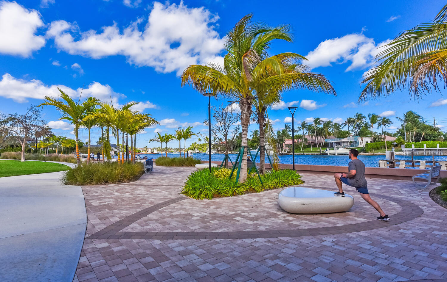 99 Southeast Mizner Boulevard, Unit PH 909 Boca Raton, FL 33432 - Photo 41 of 51 a view of a park with potted plants