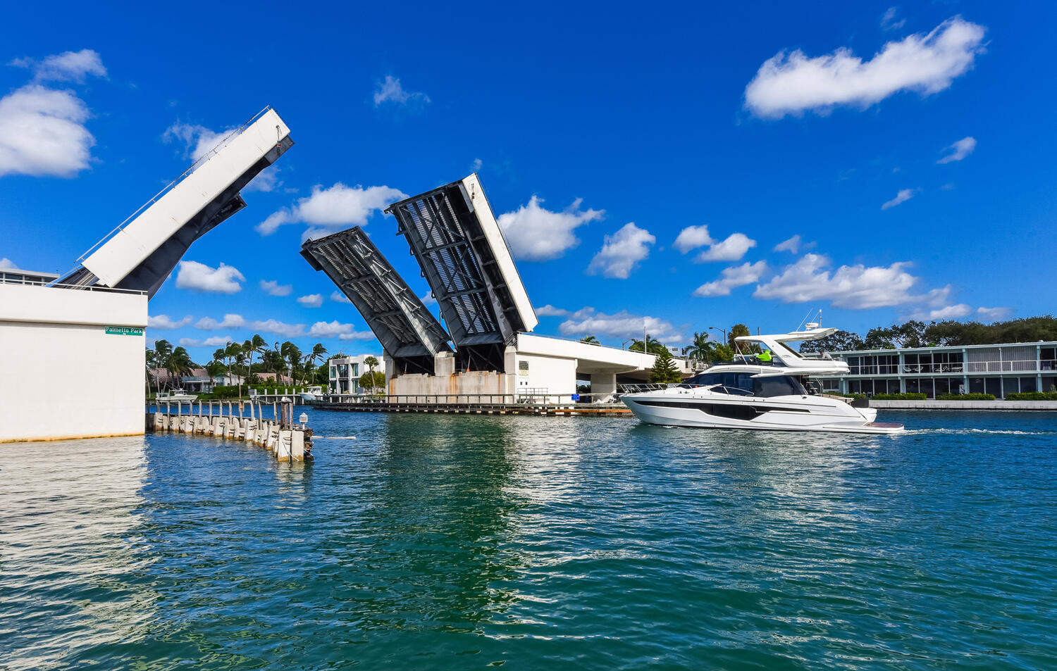 99 Southeast Mizner Boulevard, Unit PH 909 Boca Raton, FL 33432 - Photo 42 of 51 a view of a swimming pool with lounge chair