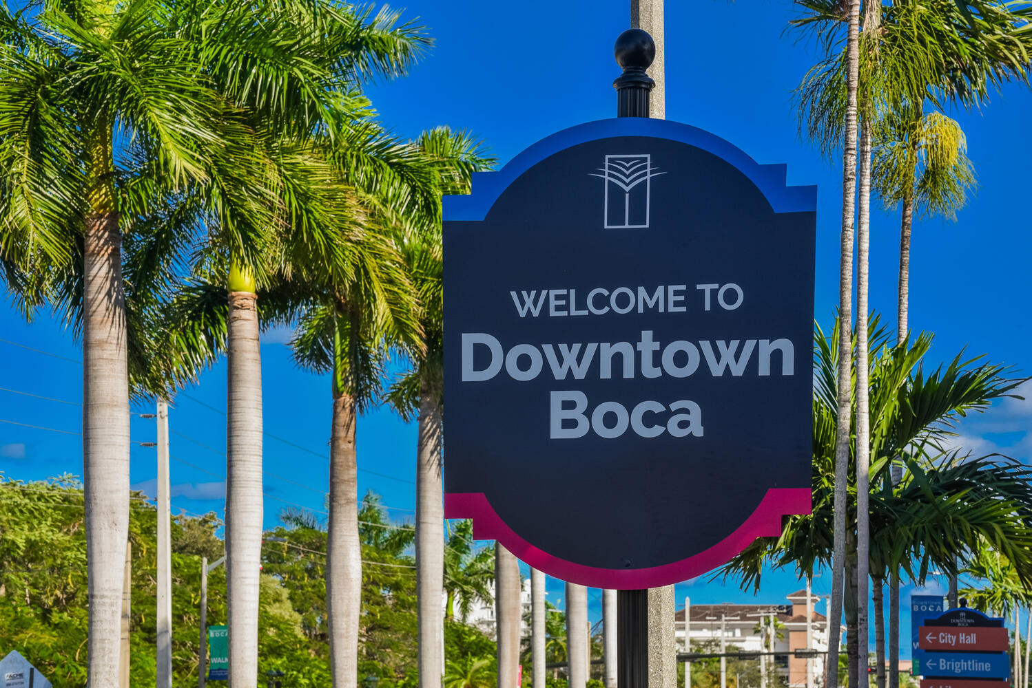 99 Southeast Mizner Boulevard, Unit PH 909 Boca Raton, FL 33432 - Photo 50 of 51 a sign that is on a pole