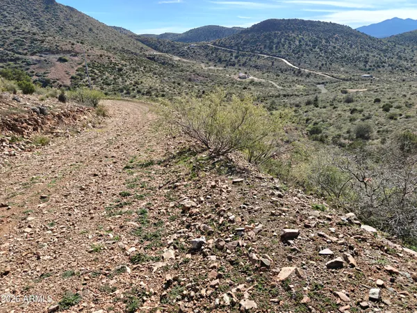 a view of mountains and valleys