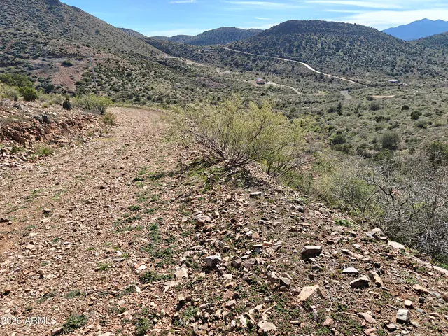 a view of mountains and valleys