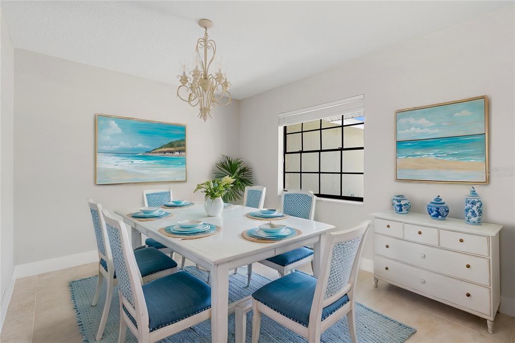 3929 North Sagomon Point Crystal River, FL 34428 - Photo 16 of 58 a view of a dining room with furniture and window