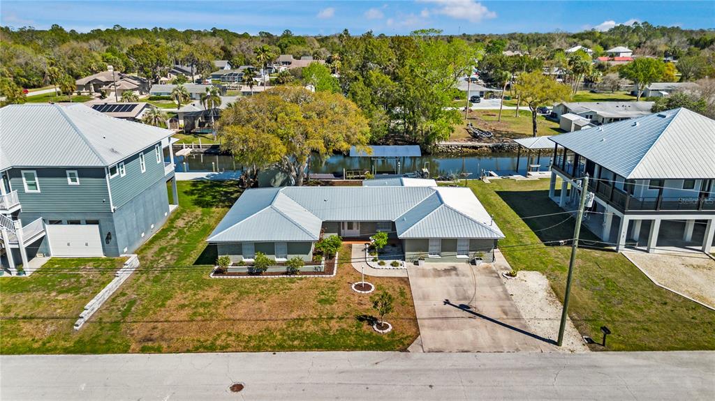 3929 North Sagomon Point Crystal River, FL 34428 - Photo 3 of 58 an aerial view of residential houses with outdoor space
