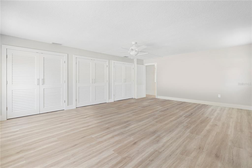 3929 North Sagomon Point Crystal River, FL 34428 - Photo 31 of 58 a view of an empty room with wooden floor