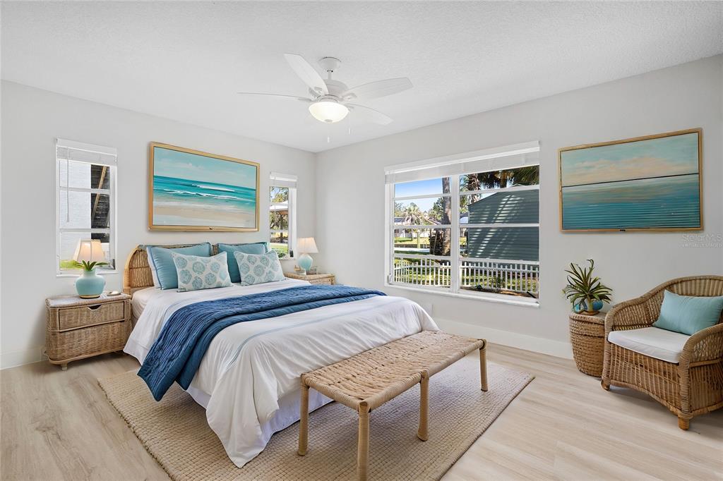 3929 North Sagomon Point Crystal River, FL 34428 - Photo 35 of 58 a spacious bedroom with a bed and a couch