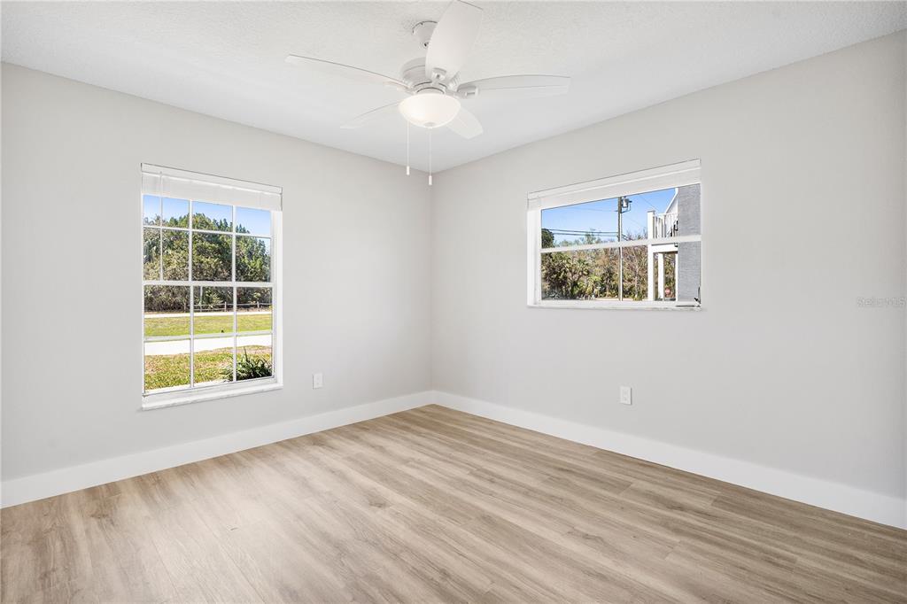 3929 North Sagomon Point Crystal River, FL 34428 - Photo 41 of 58 wooden floor in an empty room with a window
