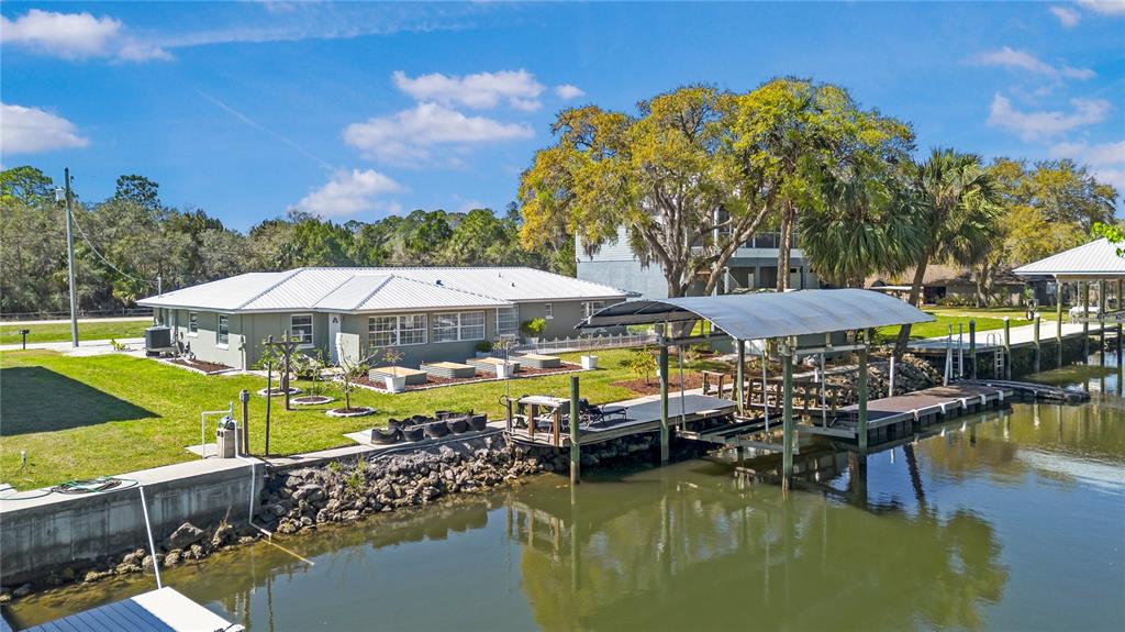 3929 North Sagomon Point Crystal River, FL 34428 - Photo 9 of 58 a swimming pool with outdoor seating and yard