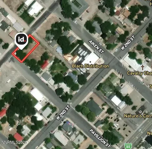 an aerial view of multi story residential apartment building with yard