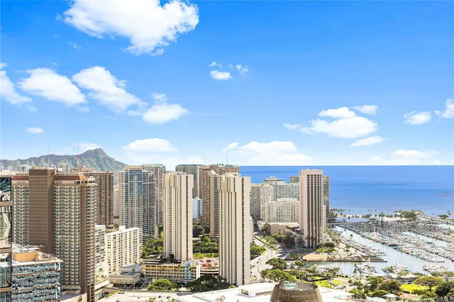 a view of a city with tall buildings