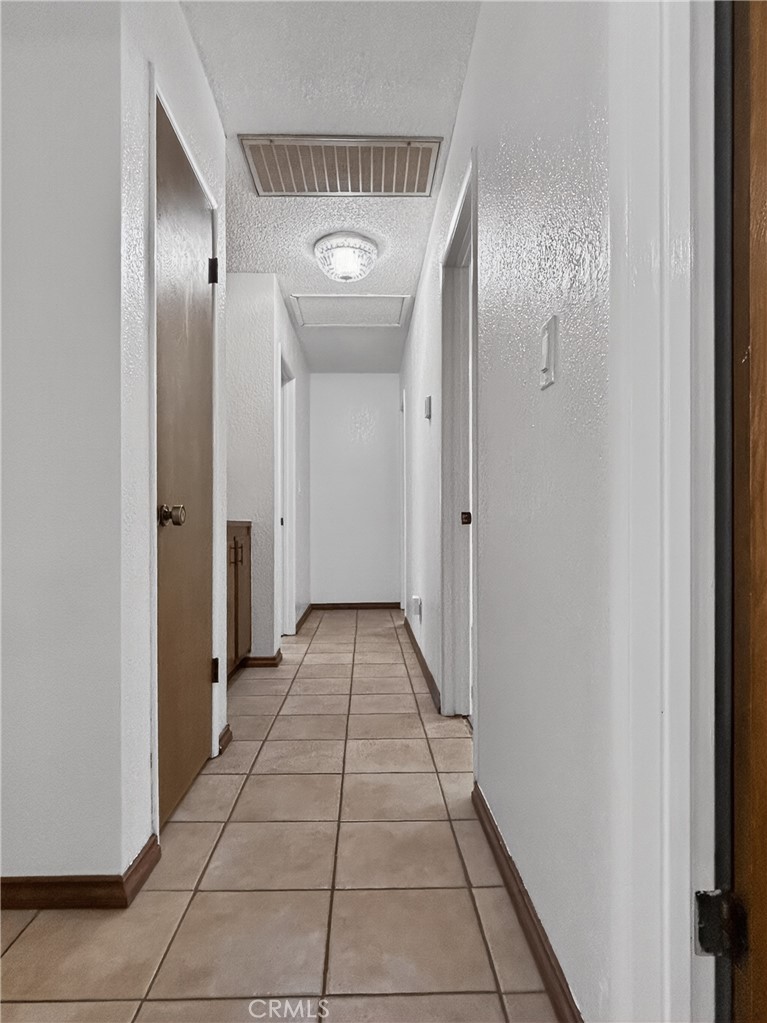 7451 Diamond Street Riverside, CA 92504 - Photo 12 of 31 a view of a hallway