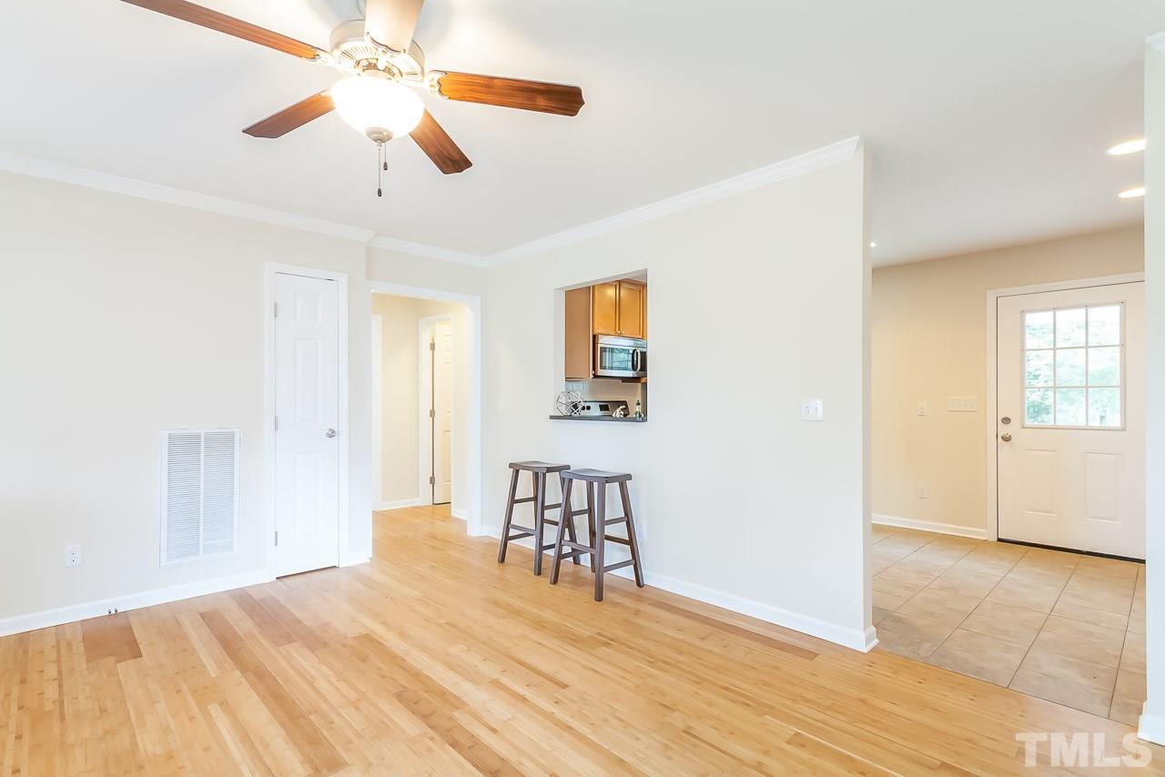 620 Brighton Road Raleigh, NC 27610 - Photo 14 of 25 a view of empty room with wooden floor