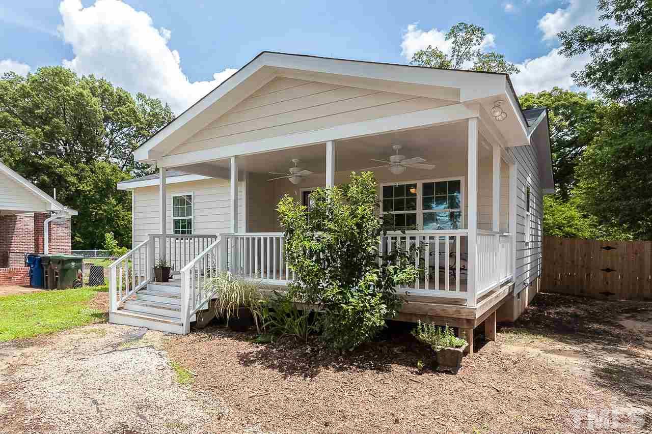 620 Brighton Road Raleigh, NC 27610 - Photo 3 of 25 a view of a house with backyard and sitting area