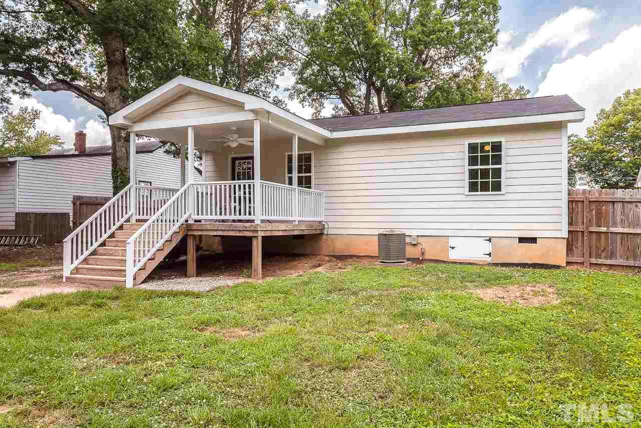 620 Brighton Road Raleigh, NC 27610 - Photo 6 of 25 a view of a house with a yard and sitting area