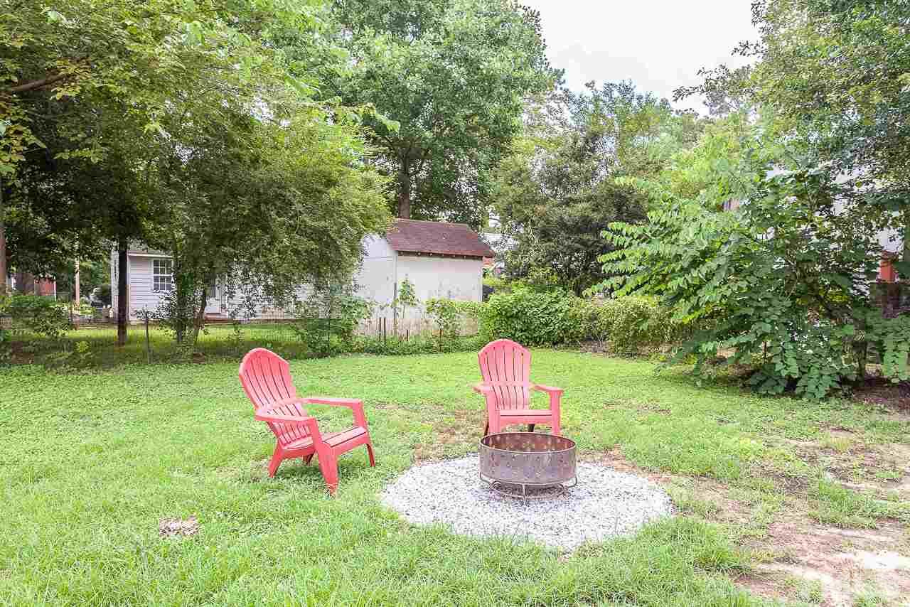 620 Brighton Road Raleigh, NC 27610 - Photo 7 of 25 a garden view with a sitting space