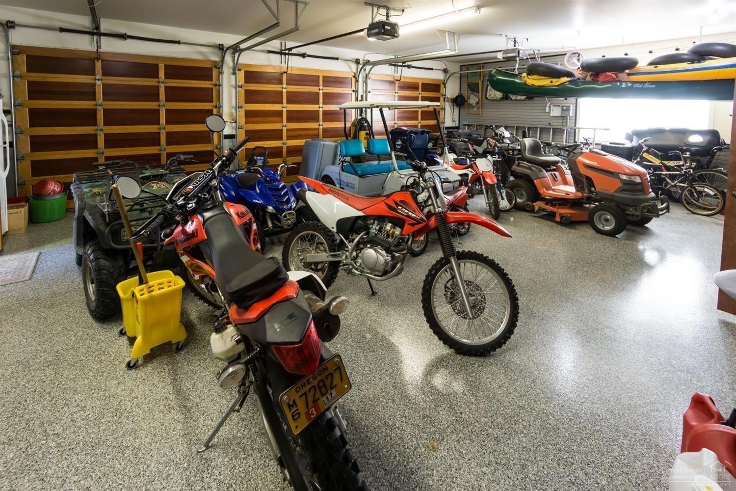18985 Couch Market Road Bend, OR 97703 - Photo 19 of 24 3 car heated garage with epoxy floor coa