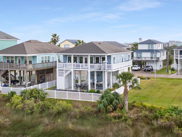 front view of a house with a swimming pool