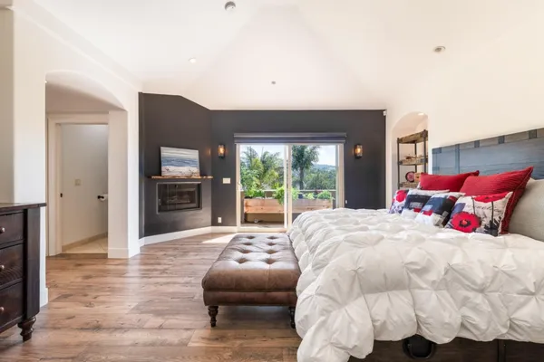 a bed room with a bed and a couch