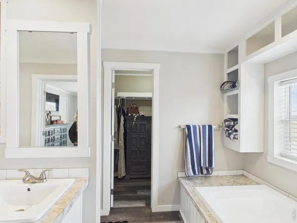 a bathroom with a sink and a bathtub