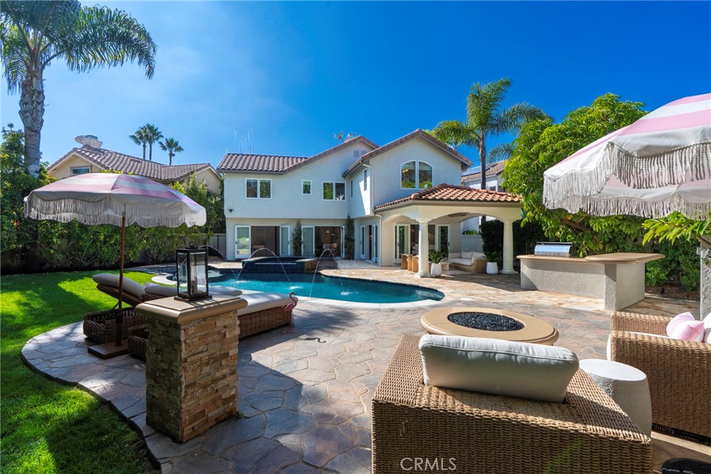 20 Regina Dana Point, CA 92629 - Photo 11 of 60 a front view of a house with swimming pool having outdoor seating