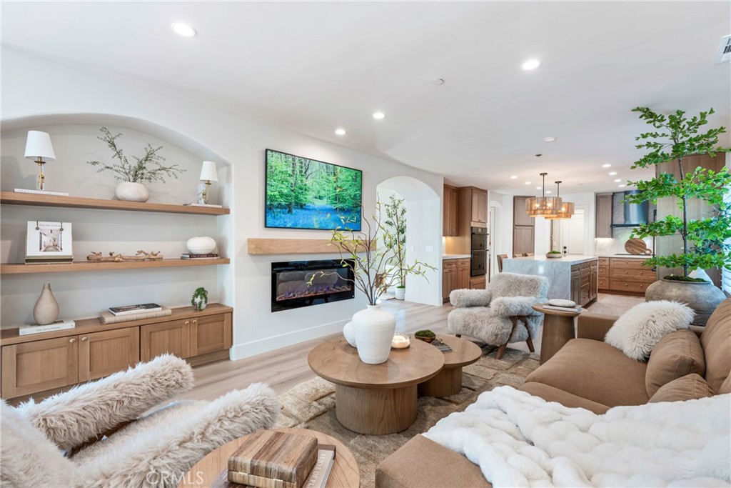 20 Regina Dana Point, CA 92629 - Photo 25 of 60 a living room with furniture and a fireplace
