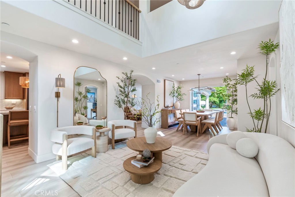 20 Regina Dana Point, CA 92629 - Photo 30 of 60 a living room with furniture and a potted plant