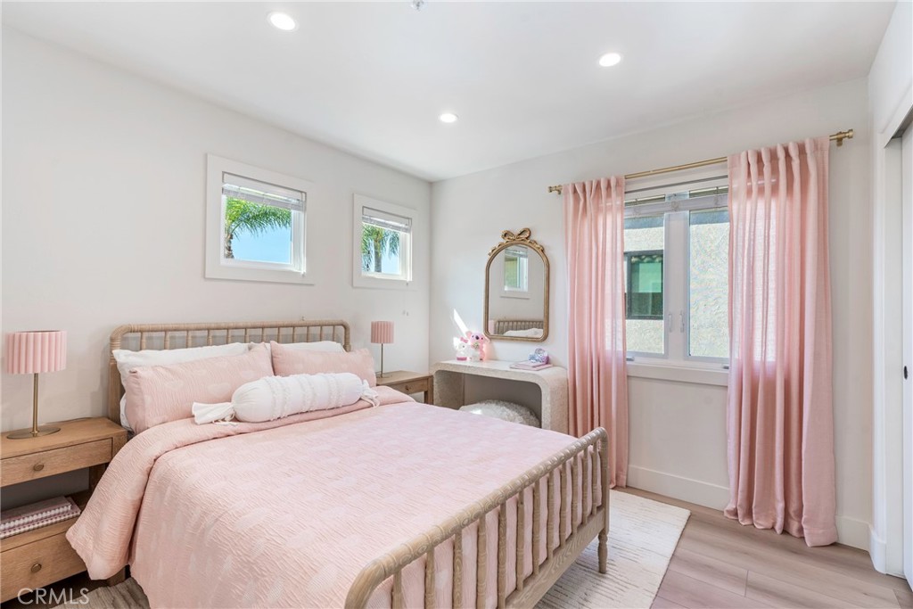 20 Regina Dana Point, CA 92629 - Photo 36 of 60 a bedroom with a large bed and a window