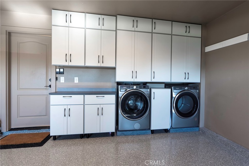 20 Regina Dana Point, CA 92629 - Photo 49 of 60 a utility room with sink dryer and washer