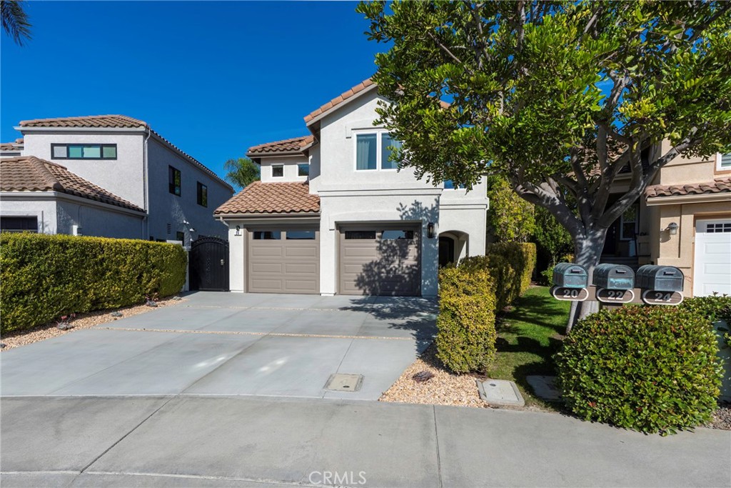 20 Regina Dana Point, CA 92629 - Photo 51 of 60 a front view of a house with garden