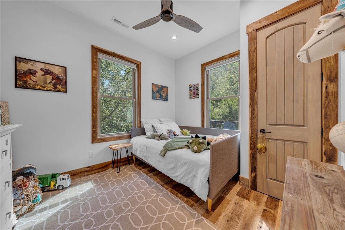 317 Little Creek Road Pleasant Shade, TN 37145 - Photo 33 of 64 a bed room with a bed and a couch