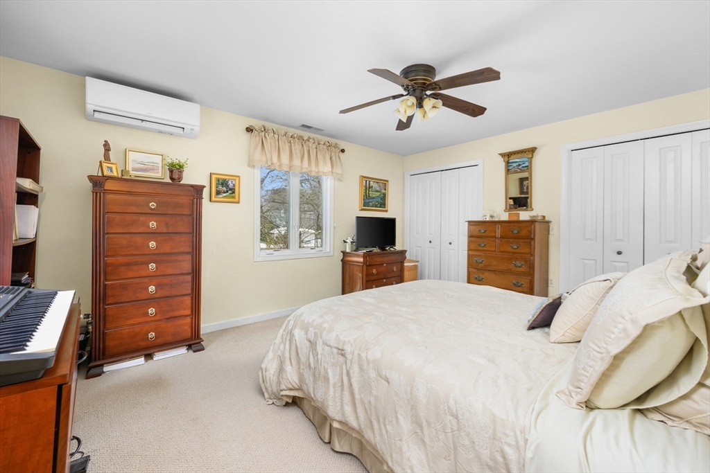 1 Seastrand Way, Unit 1 Chatham, MA 02633 - Photo 18 of 35 a bedroom with a bed and a closet
