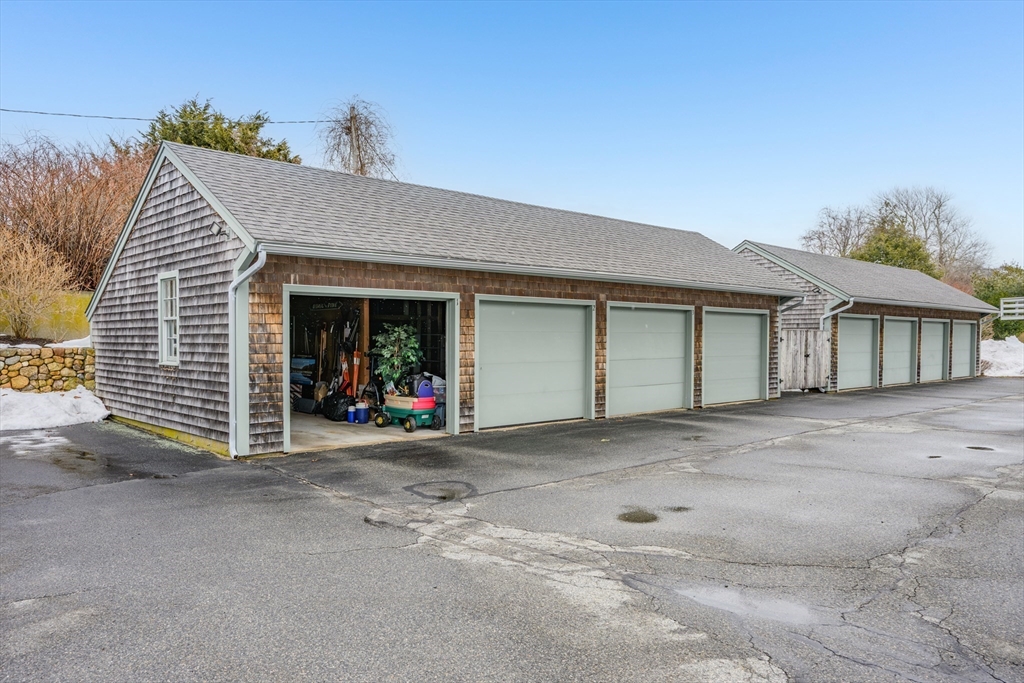 1 Seastrand Way, Unit 1 Chatham, MA 02633 - Photo 33 of 35 front view of a house with a garage