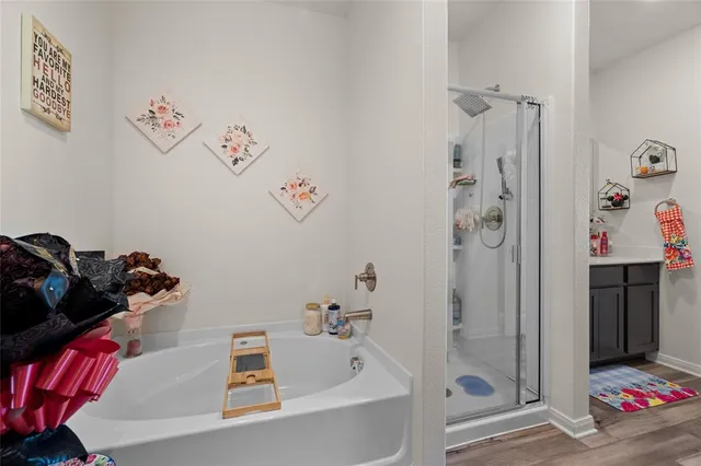 a bathroom with a sink a toilet and vanity