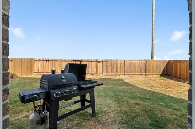 a bathroom with a sink mirror and vanity