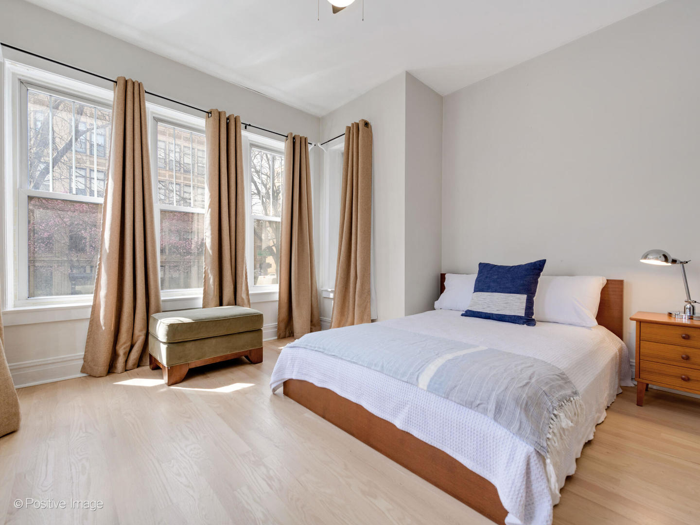 6259 North Sheridan Road, Unit 50 Chicago, IL 60660 - Photo 13 of 18 a bedroom with a bed and a large window