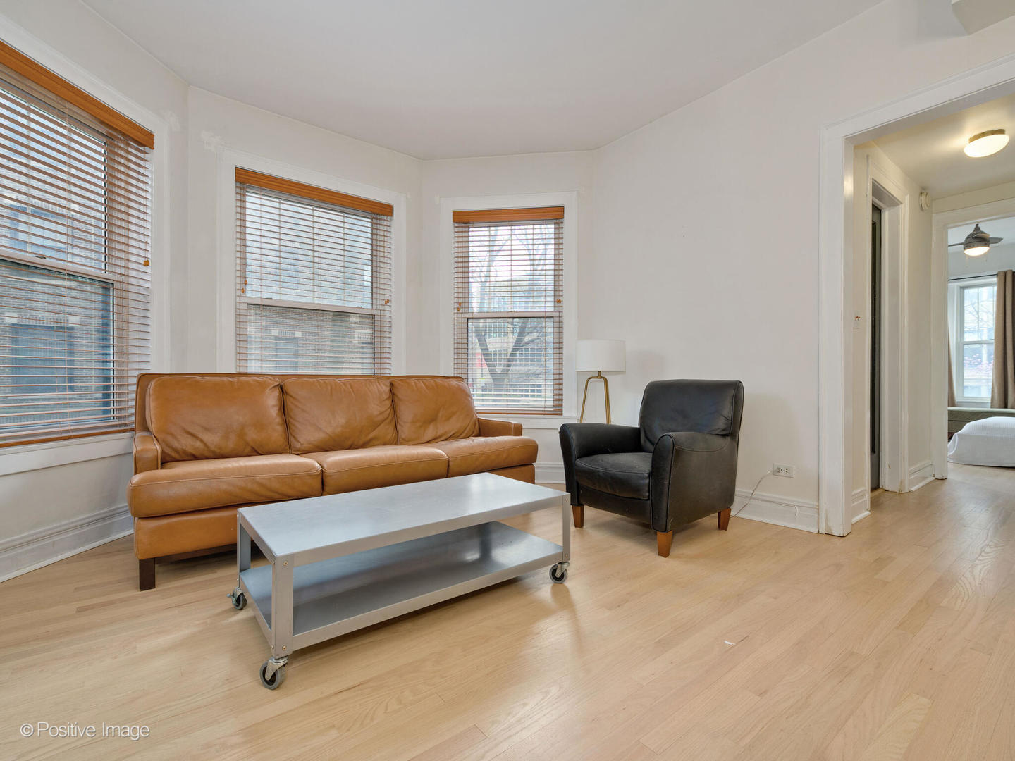 6259 North Sheridan Road, Unit 50 Chicago, IL 60660 - Photo 3 of 18 a living room with furniture and a window