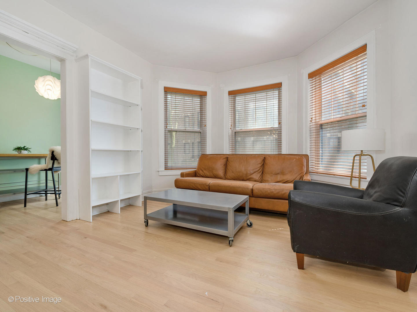 6259 North Sheridan Road, Unit 50 Chicago, IL 60660 - Photo 6 of 18 a living room with furniture and a window