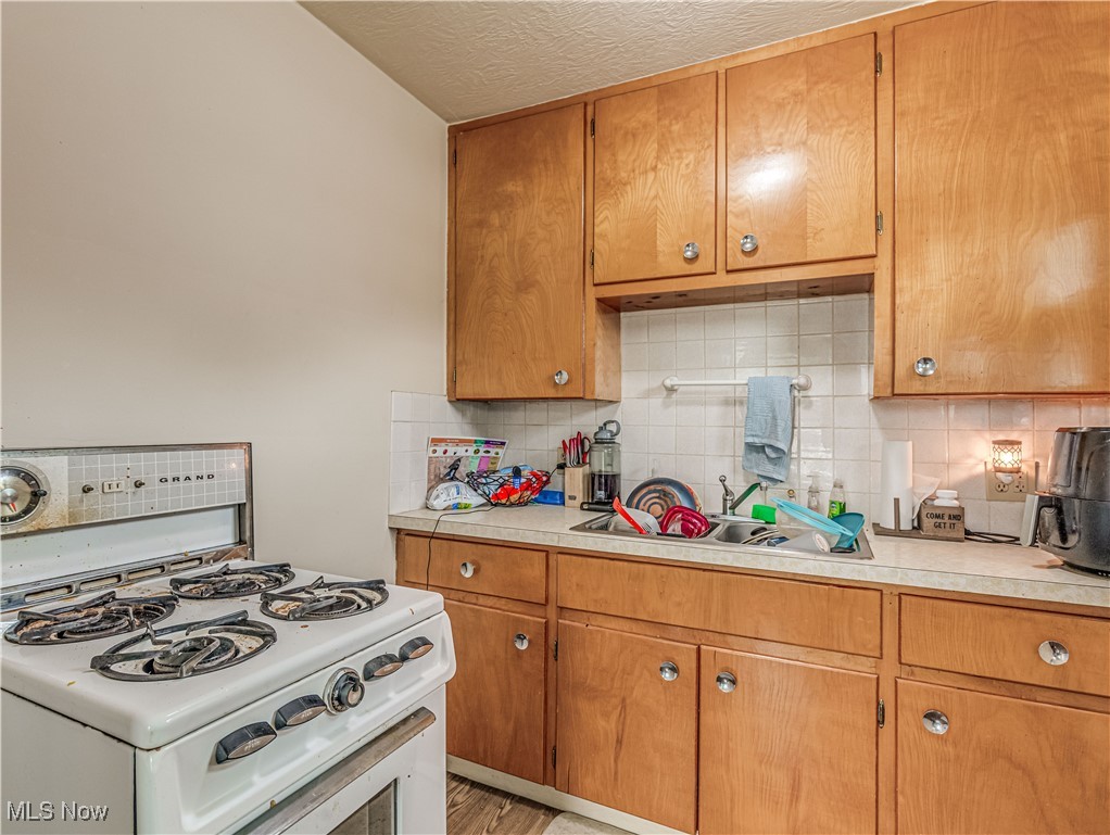642 East Wilbeth Road Akron, OH 44306 - Photo 15 of 39 Unit 2 Efficiency Kitchen featuring wood cabinets