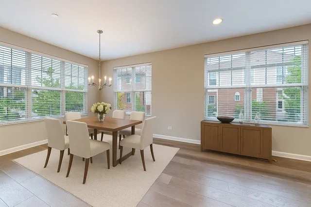 a view of a dining room with furniture window and outside view