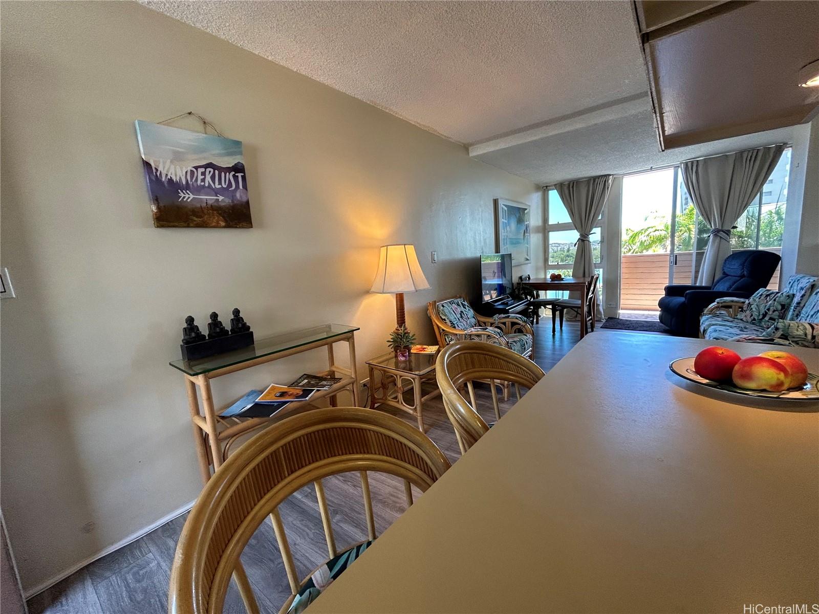 454 Nāmāhana Street, Unit 701 Honolulu, HI 96815 - Photo 7 of 25 a view of a livingroom with furniture water and windows