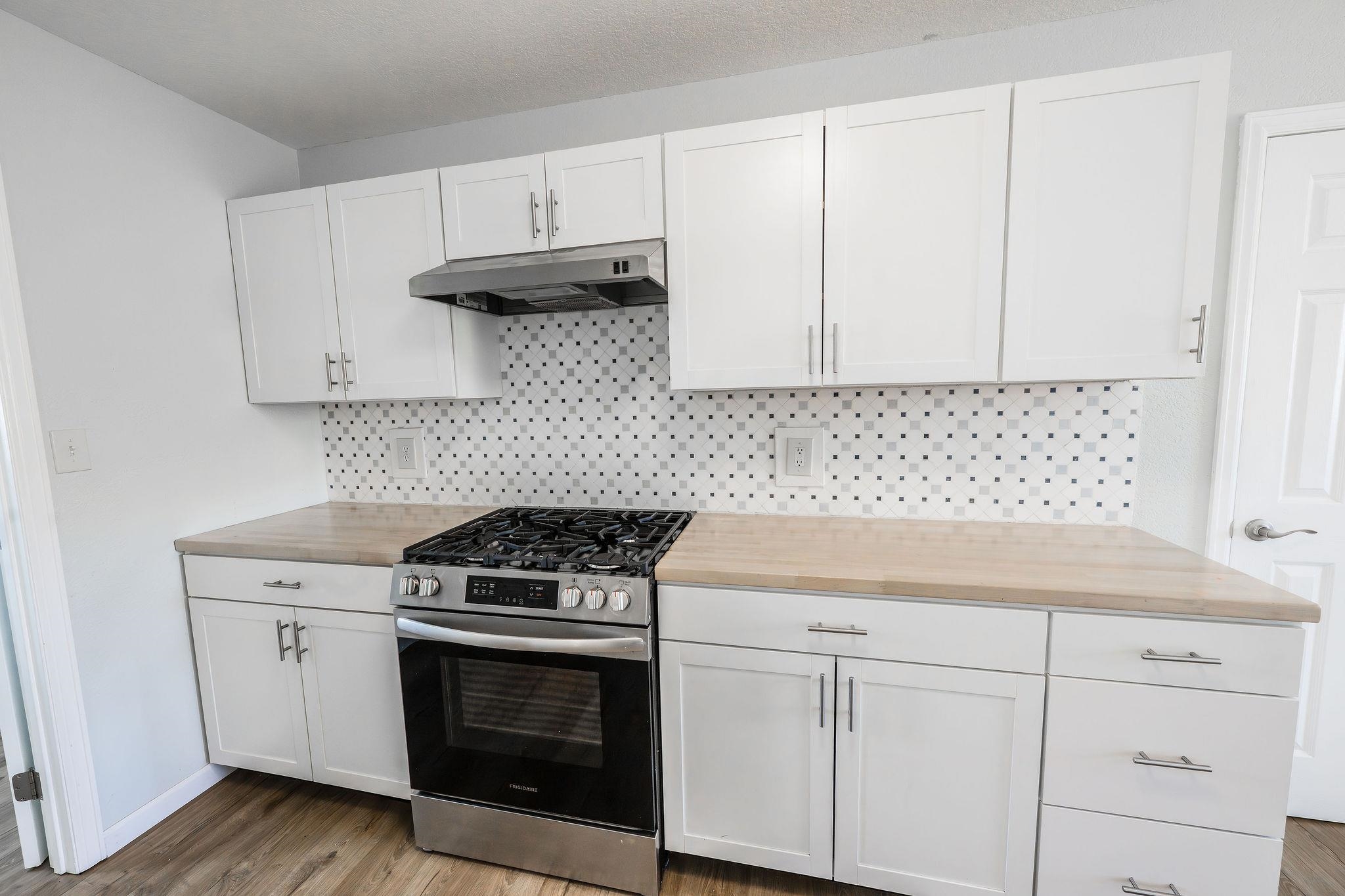 455 David Court Fruita, CO 81521 - Photo 6 of 28 a kitchen with cabinets appliances and a sink