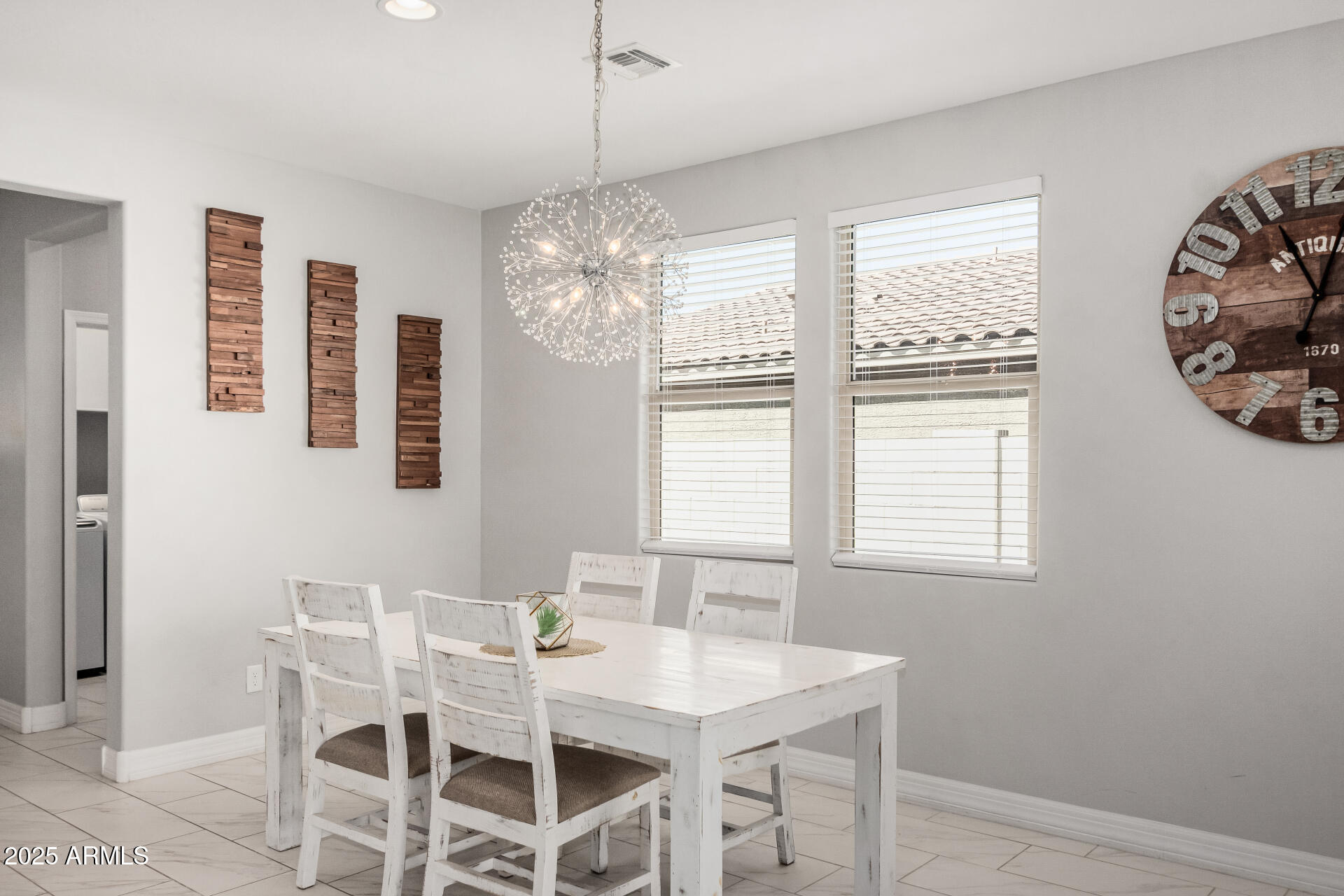 17784 West Sandy Road Goodyear, AZ 85338 - Photo 9 of 38 a view of a dining room with furniture window and outside view